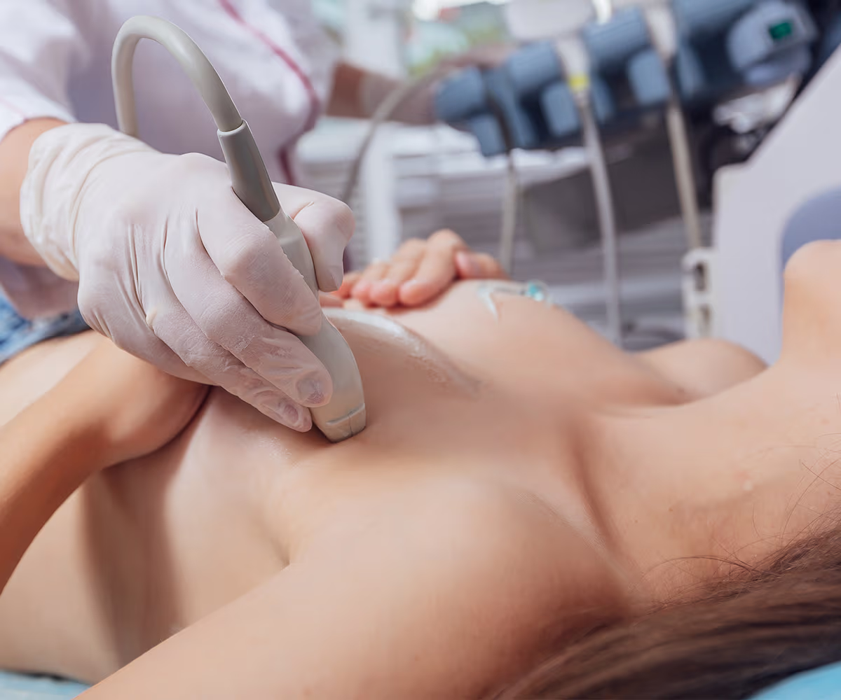 Breast Ultrasound Accent Image showing a woman gettng a breast exam